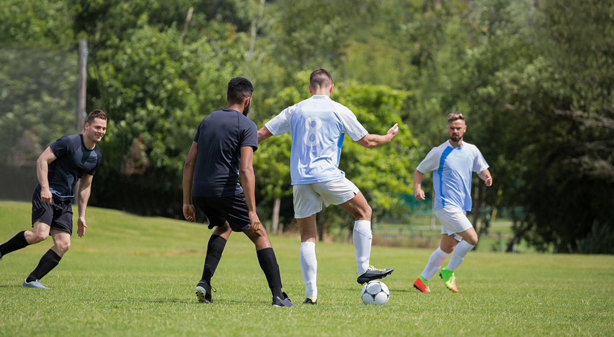 men playing soccer