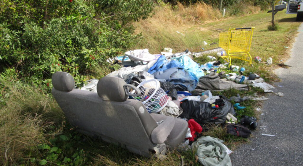 Trash by the road from illegal dumping in Polk County Florida
