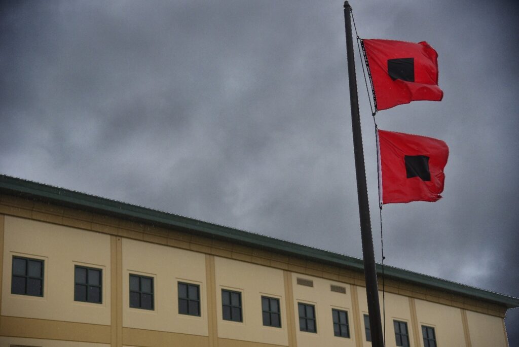 Polk County hurricane flags blowing in the wind during storm