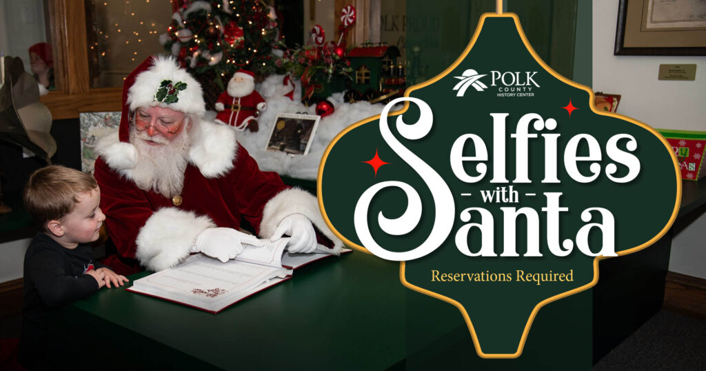 young boy talking to Santa Claus at History Center; Selfies with Santa; Polk County History Center logo