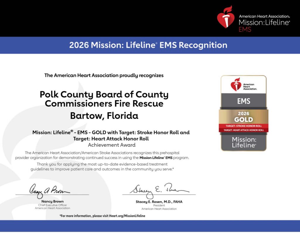 American Heart Association award certificate for Polk County Board of County Commissioners Fire Rescue recognizing their 2026 Mission: Lifeline® EMS achievements. Text: "2026 Mission: Lifeline® EMS Recognition The American Heart Association proudly recognizes Polk County Board of County Commissioners Fire Rescue Bartow, Florida Mission: Lifeline® - EMS – GOLD with Target: Stroke Honor Roll and Target: Heart Attack Honor Roll Achievement Award The American Heart Association/American Stroke Associations recognizes this prehospital provider organization for demonstrating continued success in using the Mission Lifeline® EMS program. Thank you for applying the most up-to-date evidence-based treatment guidelines to improve patient care and outcomes in the community you serve.* Nancy Brown Chief Executive Officer American Heart Association Stacey E. Rosen, M.D., FAHA President American Heart Association *For more information, please visit Heart.org/MissionLifeline"