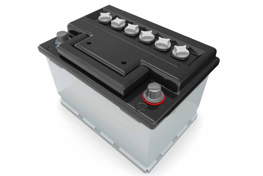 Illustration of a lead-acid car battery with a gray casing, black top, six white cell caps and positive and negative terminals on a white background.